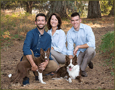 Portrait of Family With there Dogs